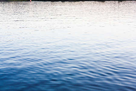 Blue water background from ocean wavesの写真素材