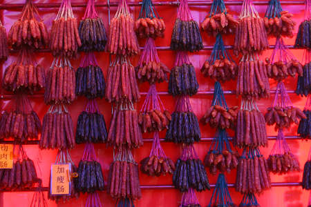 Rows upon rows of chinese waxed sausagesの写真素材