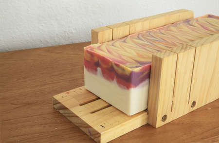 Handcrafted soap block ready to be cut into slicesの写真素材