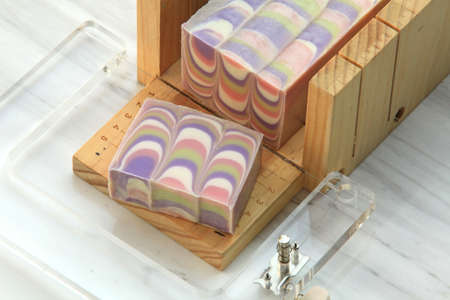 block of pretty pastel coloured soap on displayの写真素材