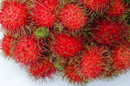 Rambutans , Rambutans fruit with leaf on white background.の写真素材