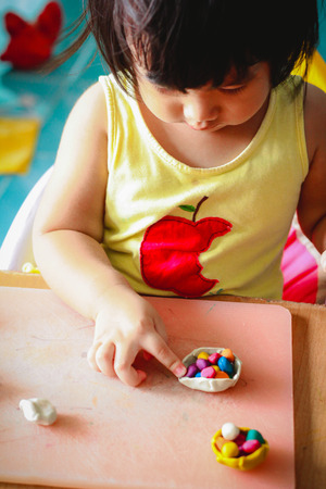 Children play clayの写真素材