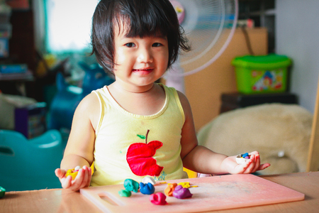 Children play clayの写真素材