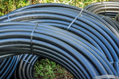 Telephone cable , Close-up of rolls of telecom IT cable tubing for internet telephone communications infrastructures.の写真素材