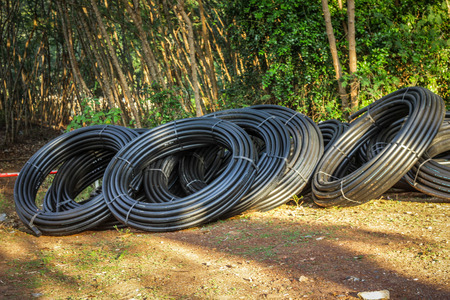Telephone cable , Close-up of rolls of telecom IT cable tubing for internet telephone communications infrastructures.の写真素材