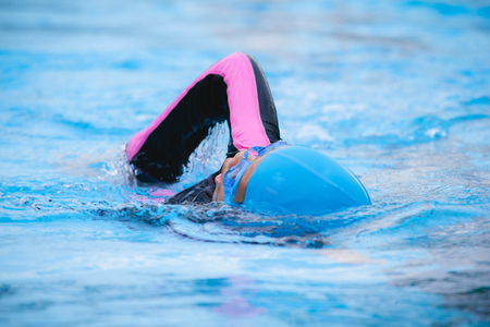 Children girl in swimming pool , Asian Gril , Thailandの写真素材