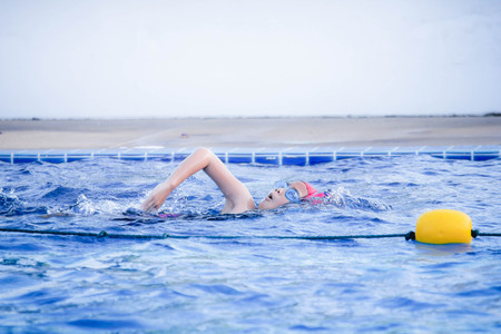 Children girl in swimming pool , Asian Girl , Thailandの写真素材