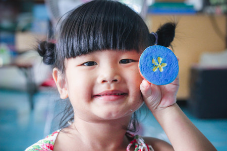 Asian girl play color water pump with fruits and vegetables,Children color pump , Color pump,...