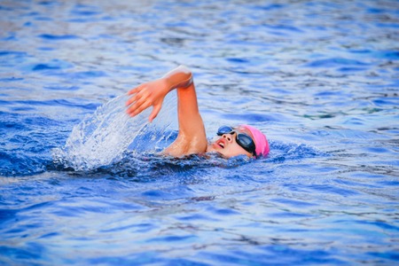 Children girl in swimming pool , Asian Girl , Thailandの写真素材