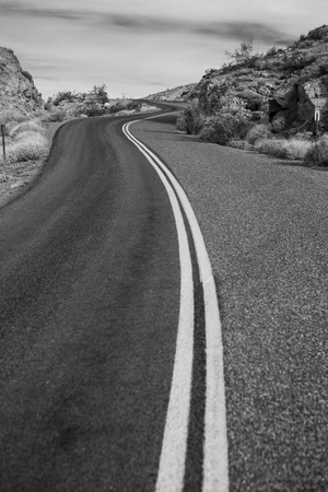 Lonely desert road - Black and Whiteの写真素材