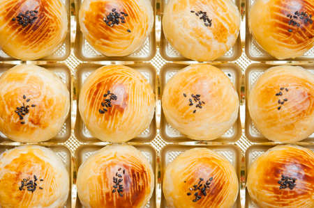 Chinese pastry or Moon cake, top view, Mooncake is a Chinese bakery product traditionally eaten...