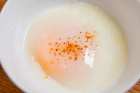 Soft boiled egg or onsen egg (onsen tamago, Hot spring egg, japanese style)の写真素材