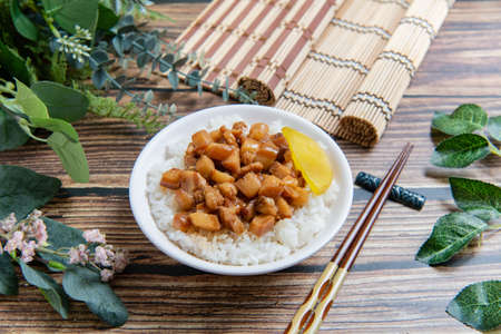 braised pork on rice is Minced pork served with pickles on top of steamed rice, taiwan foodの写真素材