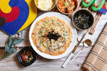 A kimchi pancake with seafood and cheese, Cheese Seafood Pajeon (Korean Pancake)の写真素材