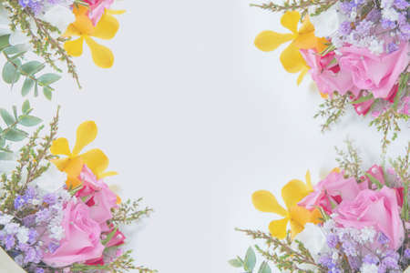 Beautiful and romantic bouquet on white background (rose, orchid, bellflower, gypsophila).の写真素材