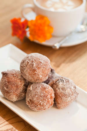 cinnamon and golden raisin beignetsの写真素材