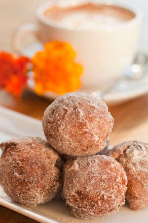 cinnamon and golden raisin beignetsの写真素材