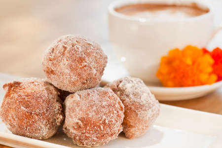 cinnamon and golden raisin beignetsの写真素材