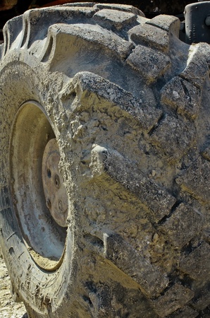 Close up to big heavy tire and wheelの写真素材