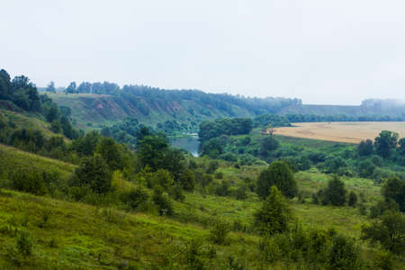 Landscape with a river and hills in Russiaの写真素材