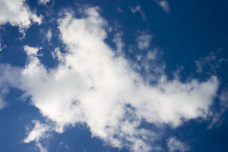 white clouds on deep blue skyの写真素材