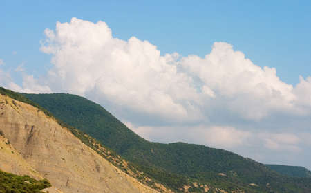 Hills with blue sky on backgroundの写真素材