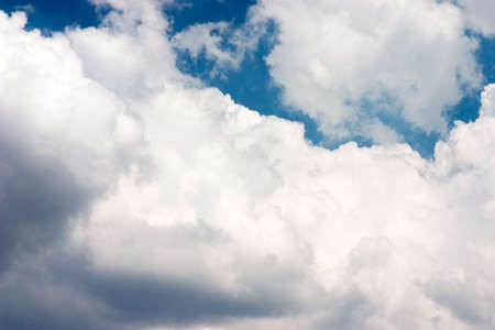 Deep blue sky with white clouds