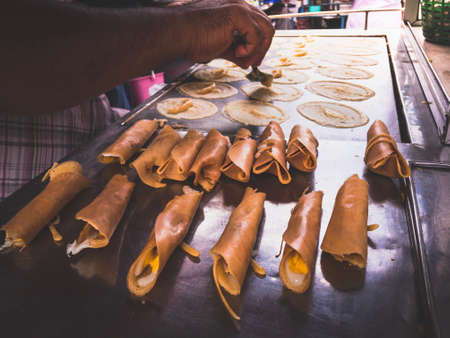 Roll pancake stuffed with minced pork, hot dog and eggの素材