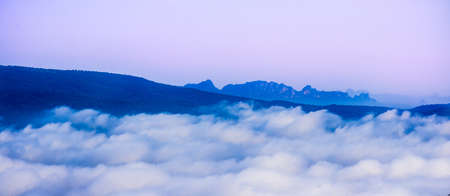 Panoramic perfect view of cloudscape with a background as mountain hill and peaks, captured at Phu...