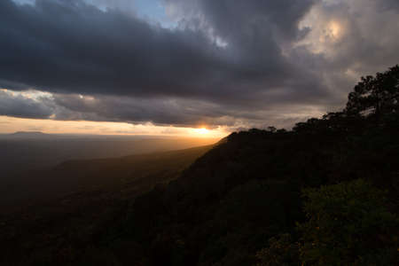 The  mountain ridges with sun light at Phu Kra Dung National park of Thailandの写真素材
