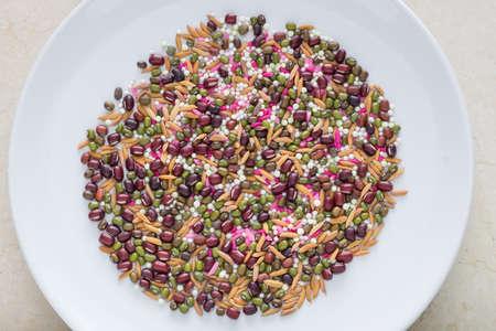 mixing seeds in the plateの写真素材