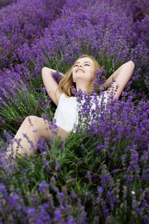 Adorable girl in fairy field of lavenderの写真素材