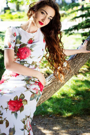 Beautiful girl  in green parkの写真素材