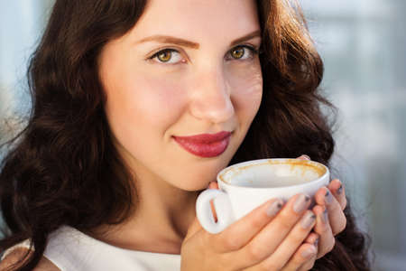 Girl spending time in a cafe の写真素材