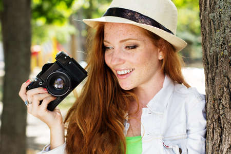 Nice girl photographer at work
