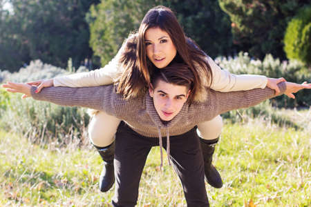Young happy couple in the  park