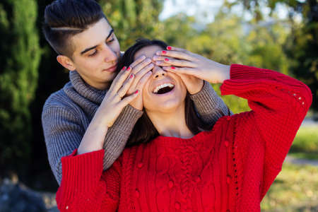 Young happy couple in the  parkの写真素材