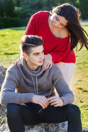 Young happy couple in the  parkの写真素材