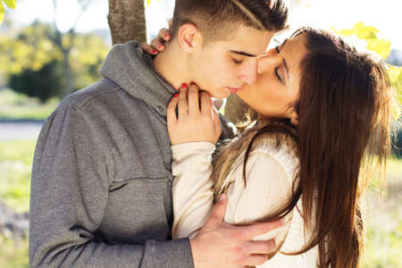 Young happy couple in the  park