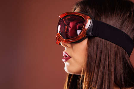 Portrait of woman with ski gogglesの写真素材