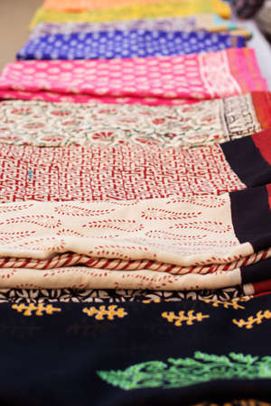 Various of colorful Indian cloth in market, India