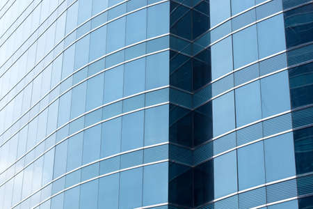 Office glass windows with beautiful reflection in center of Hong Kong, Asia.