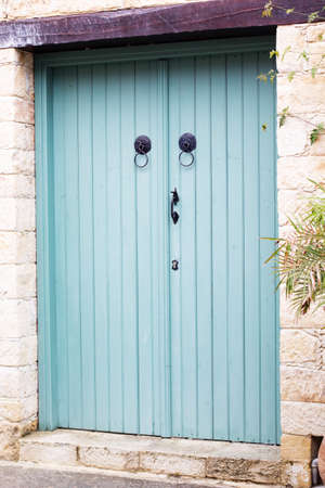 Classic blue wooden doors of house in Cyprusの写真素材