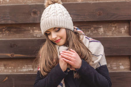 Pretty girl is wearing warm winter clothesの写真素材