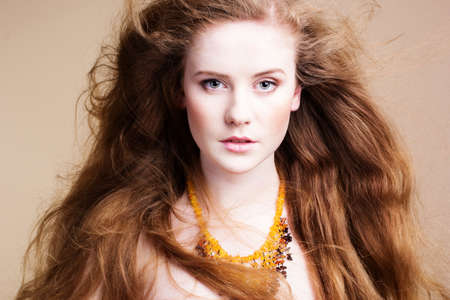 Photo of beautiful woman with magnificent hairの写真素材