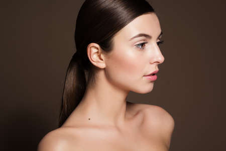 Portrait of a naturally beautiful girl with flawless perfect skinの写真素材