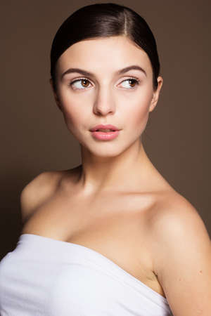 Portrait of a naturally beautiful girl with flawless perfect skinの写真素材