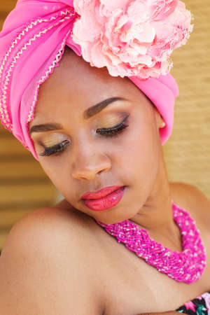 Young south african zulu woman in traditional clothes portrait outdoorsの写真素材