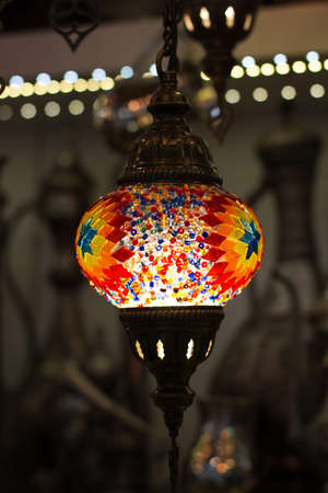 Traditional multicolored turkish lamp hanging at the Grand Bazaar in Istanbul, Turkeyの写真素材