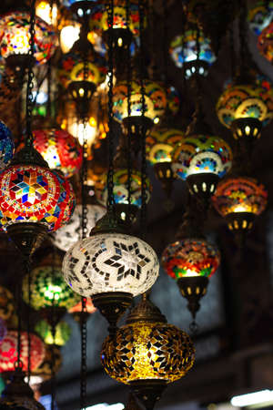 Group of traditional colored turkish lamps hanging at the Grand Bazaar in Istanbul, Turkeyの写真素材